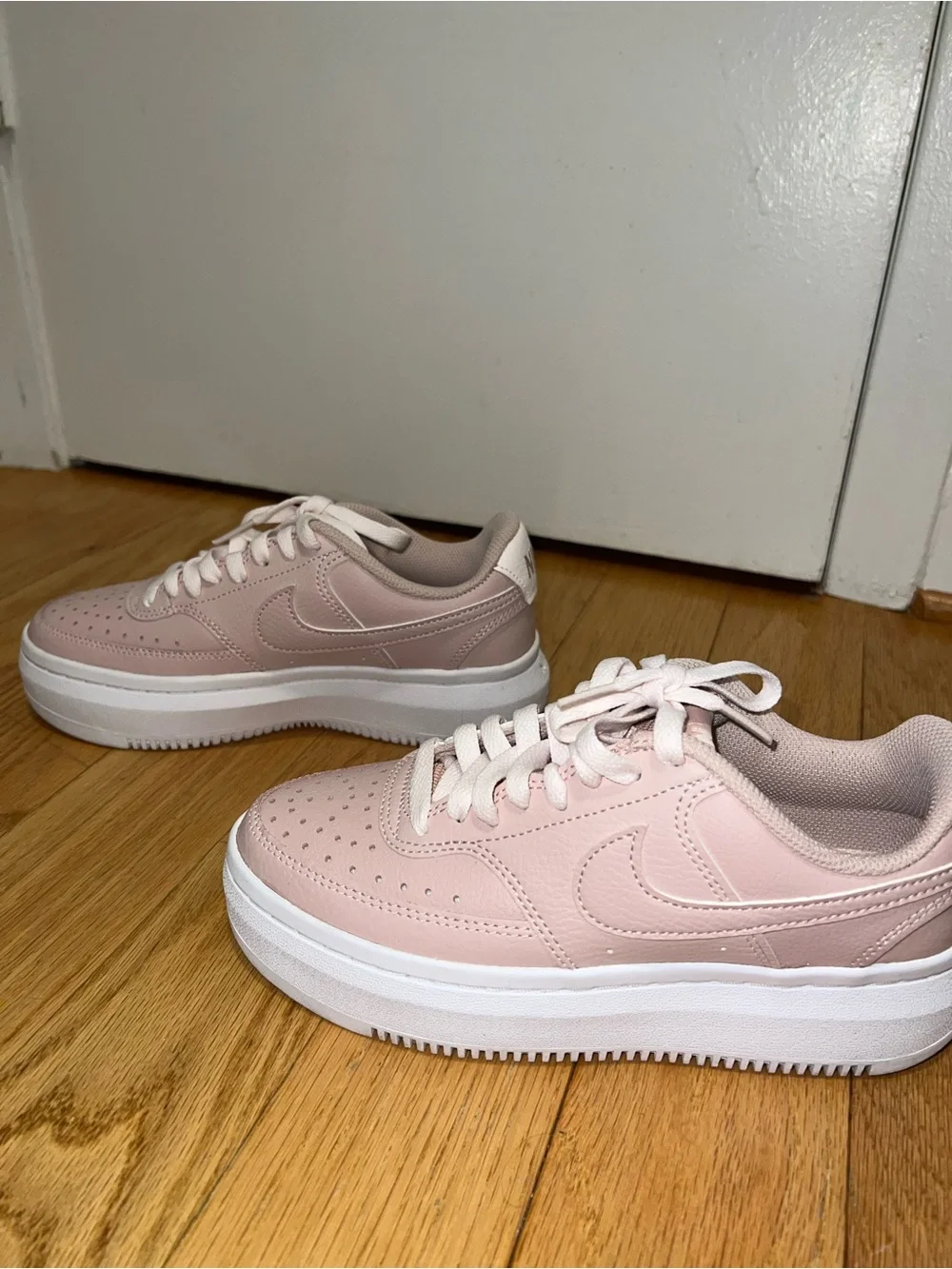 Nike Women’s Low-Top Lace-Up Sneakers in Light Pink and White